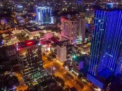 WS HA T/L View of Ho Chi Minh City downtown with city hall at night / Ho Chi Minh City, Southeastern, Vietnam Stock Footage