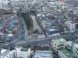 WS View of Cityscape and Traffic moving around Dongdaemun gate / Seoul, South Korea Stock Footage