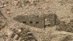 Windows line crumbling ruins on a rocky hill in the ancient emerald mining town of Sikait, Egypt. Stock Footage