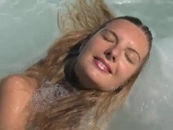 Blond girl relaxing on the SPA Stock Footage