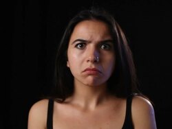 Amazed young woman listening gossips and gets surprised Stock Footage