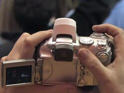October 28, 2008 CU POV Hands holding digital camera and taking photos of presidential candidate Barack Obama during  campaign rally at James Madison University/ Harrisonburg, Virginia/ AUDIO Stock Footage