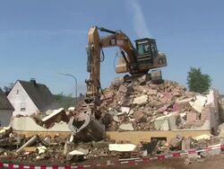MS Demolition of apartment block / Saarburg, Rhineland-Palatinate, Germany Stock Footage