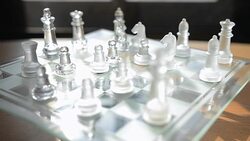 turning and panning: glass chess under sunlight Stock Footage