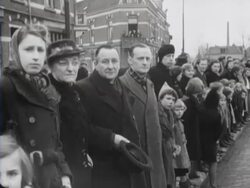 The victims of a bombardment are burried under great public interest Stock Footage