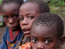 CU shot of three ugandan children looking towards / kigez, kabale, uganda Stock Footage