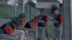 Medium shot of baseball team comforting unhappy batter / American Fork, Utah, United States Stock Footage