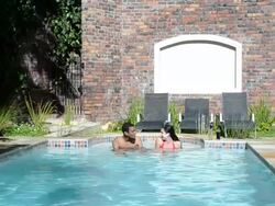 Young couple chatting in the pool Stock Footage