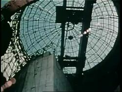 Cooling towers sit on the site of a nuclear power plant. News Clip