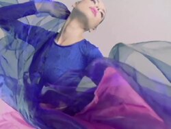 Beautiful woman dancing in colored silk. Slow motion. Stock Footage