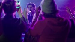 Crowd taking cellphone pictures of concert Stock Footage