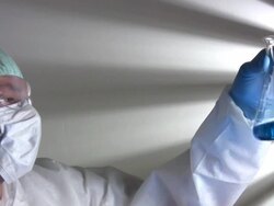 Inspecting Science Worker holding Flask Stock Footage