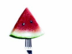 WATERMELON ROTATING ON FORK-LOOPED-1080HD Stock Footage