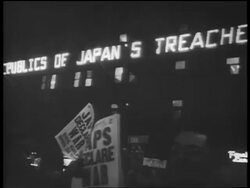B/W Dec. 7 1941 man selling newspapers 'Japs declare war' / ticker board in background / newsreel Stock Footage