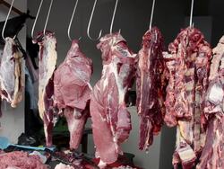 MS Fresh meat hanging in hooks at shop / Otavalo, Ecuador Stock Footage