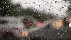 Traffic during rainy season Stock Footage