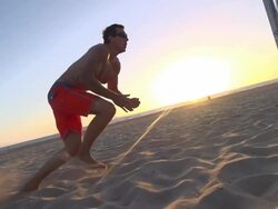 Men playing beach volleyball. - Slow Motion - filmed at 240 fps Stock Footage