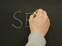 Writing 'Sex' on the school blackboard Stock Footage
