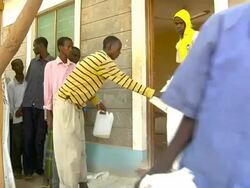 People waiting in line for food distribution Stock Footage