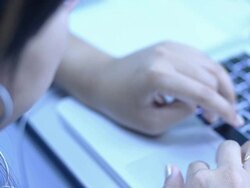 Typing on laptop keyboard Stock Footage