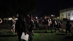 CLEAN : Protesters gather and march near Kenosha city hall at night News Clip