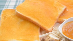 Breakfast toast with jam Helianthus tuberosus Stock Footage