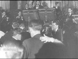 1920s: NEW YORK CITY: HA TD WS Times Square, Broadway & 7th Avenue, HA LS Men escorting women out of cabs, MS 'Villa Vallee' sign, VS People slow dancing on dance floor w/ band BG, WS Entertainer Rudy Vallee (1901-1986) singing on stage (SOT). Instructional Video