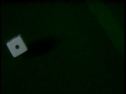 High Speed two dice roll into view together, one hits side of games table collides with other die, both stop close by each other showing a score of double six, hand picks up dice, Chance, Luck, Stock Footage