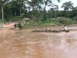 A man transporting commodities to the other side of the river Stock Footage