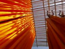 Newly dyed fabric being hung up to dry, Sari garment factory, Rajasthan, India, Stock Footage
