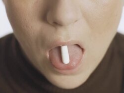 HD SLOW MOTION: Woman Taking A Capsule Stock Footage