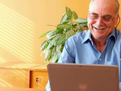 Laughing Man at Computer P MCU1 Stock Footage