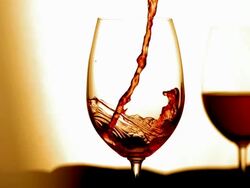 HD Super Slow-Mo: Pouring Wine Into Glass Stock Footage
