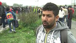 Interview with Asylum Seeker Waiting to Be Processed News Clip