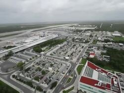 AERIAL WS view of air traffic control tower / Cancun, Quintana Roo, Mexico Stock Footage