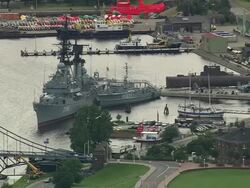 AERIAL Military ships in naval base, Wilhelmshaven, Lower Saxony, Germany Stock Footage