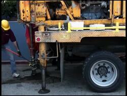 Shoveling Soil, Earth, Dirt Samples from Drill Stock Footage