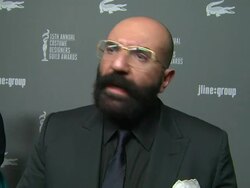 INTERVIEW - Paco Delgado on the event, working on Les Mis, Anne Hathaway's input at The 15th Annual Costume Designers Guild Awards on 2/19/13 in Los Angeles, CA. Stock Footage