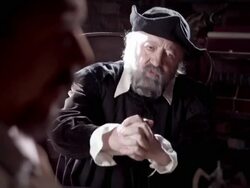 Nostradamus speaks and points to another man. Stock Footage