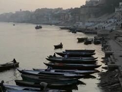 MS Shot of boats on harbor at river Ganges / Varanasi, Utter Pradesh, India  Stock Footage