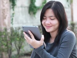 Tablet for lifestyle in playground,Bangkok Thailand Stock Footage