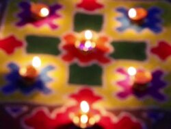 CU R/F Burning oil lamps on rangoli / Pushkar, Rajasthan, India Stock Footage