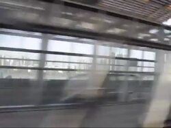 High speed train through the railway station Stock Footage