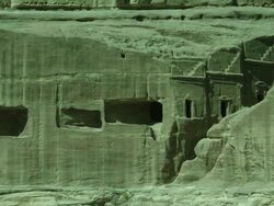 Petra archaeological site and amphitheatre, tilt down to columns, Jordan Stock Footage