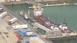 Aerials of border force patrol boat and migrant dinghies News Clip