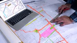 stylish architect working on blueprint Stock Footage
