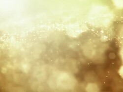 Defocused Gold Particles 2 - loopable Stock Footage