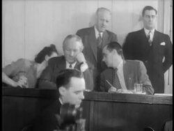 B/W 1947 man + woman talking behind back of man sitting between them at HUAC hearings / newsreel Stock Footage