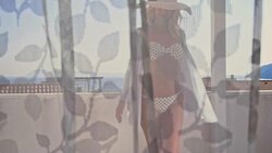 SLO MO Sexy fashionable woman going into the room Stock Footage