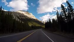 POV vehicle driving on scenic road Stock Footage